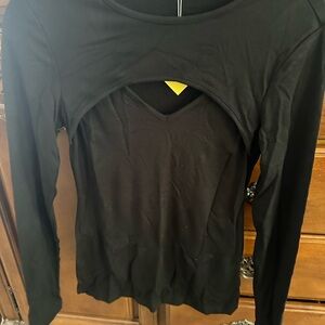 Women’s stylish black top by Herlollychips. Size Medium. NWT